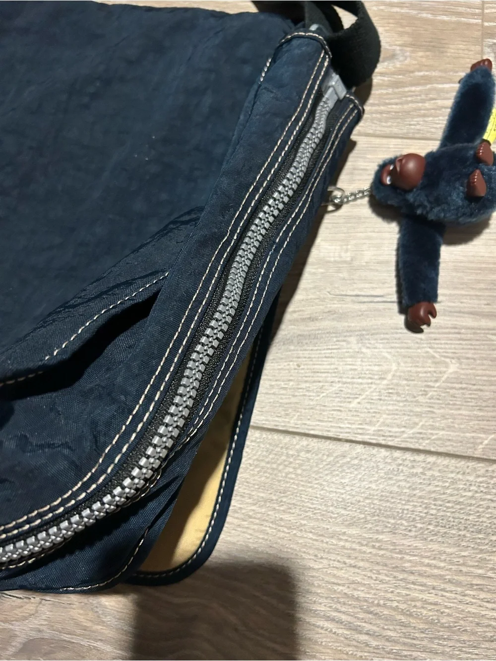 Kipling Dark Blue Expandable Messenger Bag with Monkey Charm